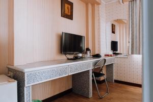 TV a/nebo společenská místnost v ubytování Tong Hsin Hotel