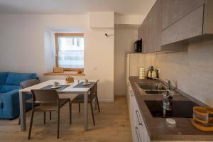 Kitchen o kitchenette sa Appartamento S. Croce