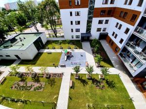 an aerial view of a courtyard in a building at Miejsko Tu - Opera #134 in Olsztyn