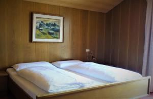 Postel nebo postele na pokoji v ubytování Pension Dolomieu + 37 fotografií