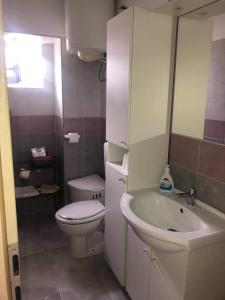 Koupelna v ubytování Apartmani Đokić