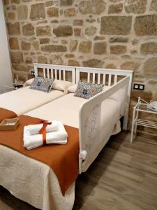 Postel nebo postele na pokoji v ubytování VTAR Casa del AOVE