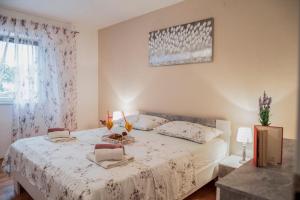 Postel nebo postele na pokoji v ubytování Villa Terra with heated pool + 37 fotografií