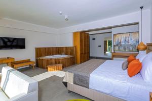 Ένα ή περισσότερα κρεβάτια σε δωμάτιο στο Yalıpark Beach Hotel