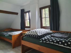 Voodi või voodid majutusasutuse Apartmány Svatá toas