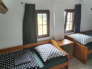 Voodi või voodid majutusasutuse Apartmány Svatá toas