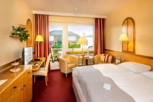 TV a/nebo společenská místnost v ubytování Akzent Hotel Berlin