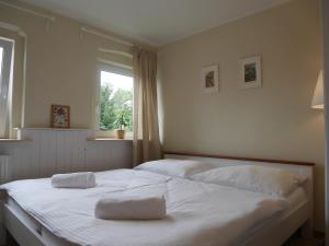 Postel nebo postele na pokoji v ubytování Sonja House Abertamy