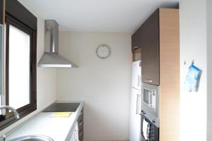 Kuchyňa alebo kuchynka v ubytovaní Mocan Perfect Stay