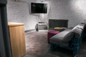 A television and/or entertainment centre at Why Not Hostel Novosibirsk