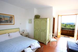 Postel nebo postele na pokoji v ubytování Casa Milena