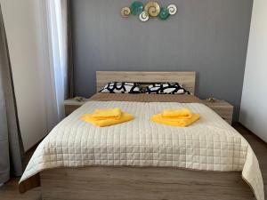 Posteľ alebo postele v izbe v ubytovaní Naplemente Apartman