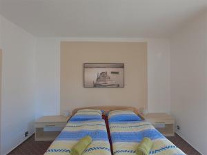 Postel nebo postele na pokoji v ubytování Penzion U Znaku Švihovských