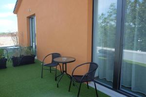 A balcony or terrace at Penzión pod brezami**