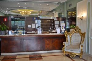 a bar in a store with a chair in front of it at Hotel Camino de Santiago in Castrillo del Val