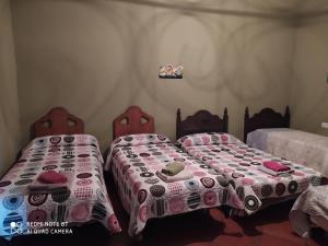 Postel nebo postele na pokoji v ubytování Casa rural la noria