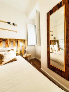Кровать или кровати в номере PÊPA Guesthouse