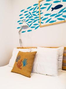 Кровать или кровати в номере PÊPA Guesthouse