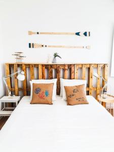 Кровать или кровати в номере PÊPA Guesthouse