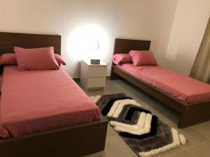 Katil atau katil-katil dalam bilik di Amwaj North Cosat