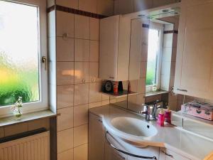 Kuchyň nebo kuchyňský kout v ubytování Pension Platzhirsch + 37 fotografií