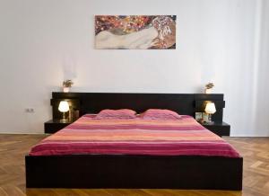 Posteľ alebo postele v izbe v ubytovaní Balcony Apartment
