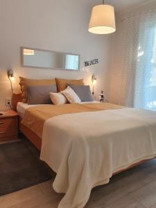 Ένα ή περισσότερα κρεβάτια σε δωμάτιο στο Apartments RELAX 1