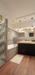 Ένα μπάνιο στο Słoneczny Apartament Jak w Domu