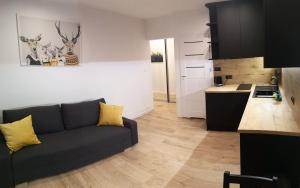 Kuchyňa alebo kuchynka v ubytovaní Apartament Izerski Raj