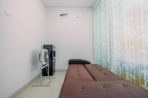 Μια τηλεόραση ή/και κέντρο ψυχαγωγίας στο Enjoy 1BR Apartment at Atlanta Residence By Travelio