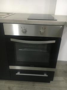 Kuchyňa alebo kuchynka v ubytovaní Apartman Mercedes