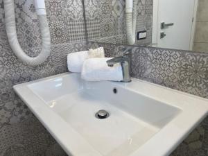 
A bathroom at La Rustica Hotel
