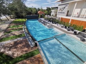 Bazén v ubytování De VeraNiO Resort nebo v jeho okolí