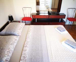 Postel nebo postele na pokoji v ubytování Villa Centar