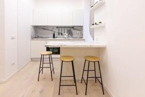 A kitchen or kitchenette at Apartment Greppi 5