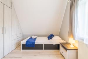 Posteľ alebo postele v izbe v ubytovaní ApartamentyGdanske EU - Golden