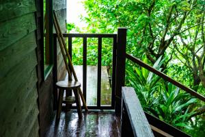 Balkón nebo terasa v ubytování Villa SACHIIBARU 浜辺の茶屋 の 宿