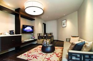TV a/nebo společenská místnost v ubytování Himalayas Hotel Shanghai