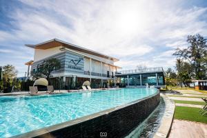 Bazén v ubytování De VeraNiO Resort nebo v jeho okolí