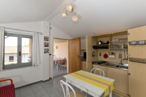 Kuchyň nebo kuchyňský kout v ubytování Residence Castiglione