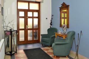 Predel za sedenje v nastanitvi Apartmány Irisis