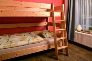 Postelja oz. postelje v sobi nastanitve Apartmány Irisis