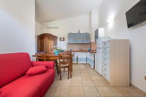 Kuchyň nebo kuchyňský kout v ubytování Sa Corte de Dinu + 23 fotografií