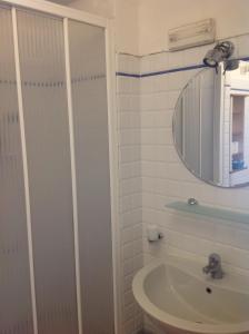 a bathroom with a shower and a sink at Affittacamere La Lanterna in Portovenere