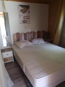 Кровать или кровати в номере Chalet calme