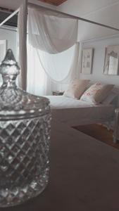 A bed or beds in a room at Neoclassical manor house