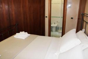 Postel nebo postele na pokoji v ubytování B&B Villa Garden