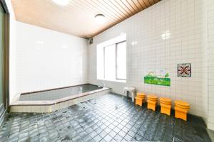 Foto sihtkohas Iwata asuva majutusasutuse 丸源旅館 無料朝食 全館wifi 準天然温泉 galeriist