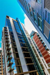 a tall building with a lot of windows at Hyatt Regency London Albert Embankment in London