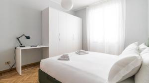 Giường trong phòng chung tại Italianway - Sacconi 2